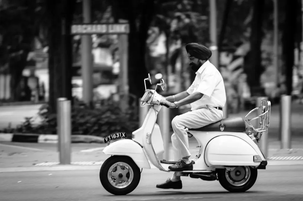 A Sikh man on a Vespa in Singapore