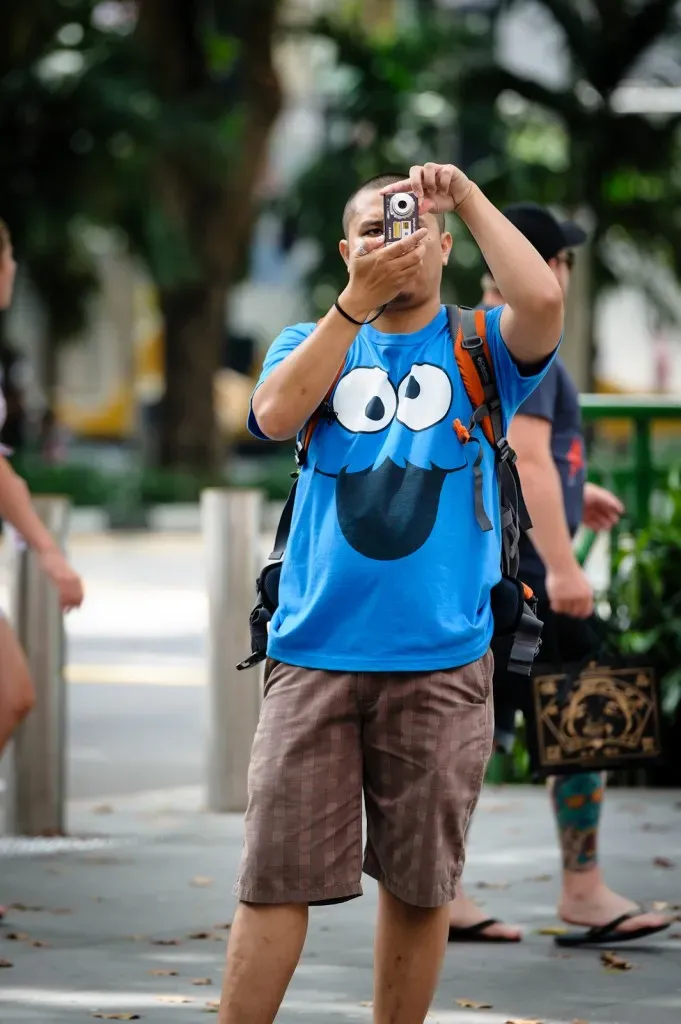 Man in cookie monster t-shirt