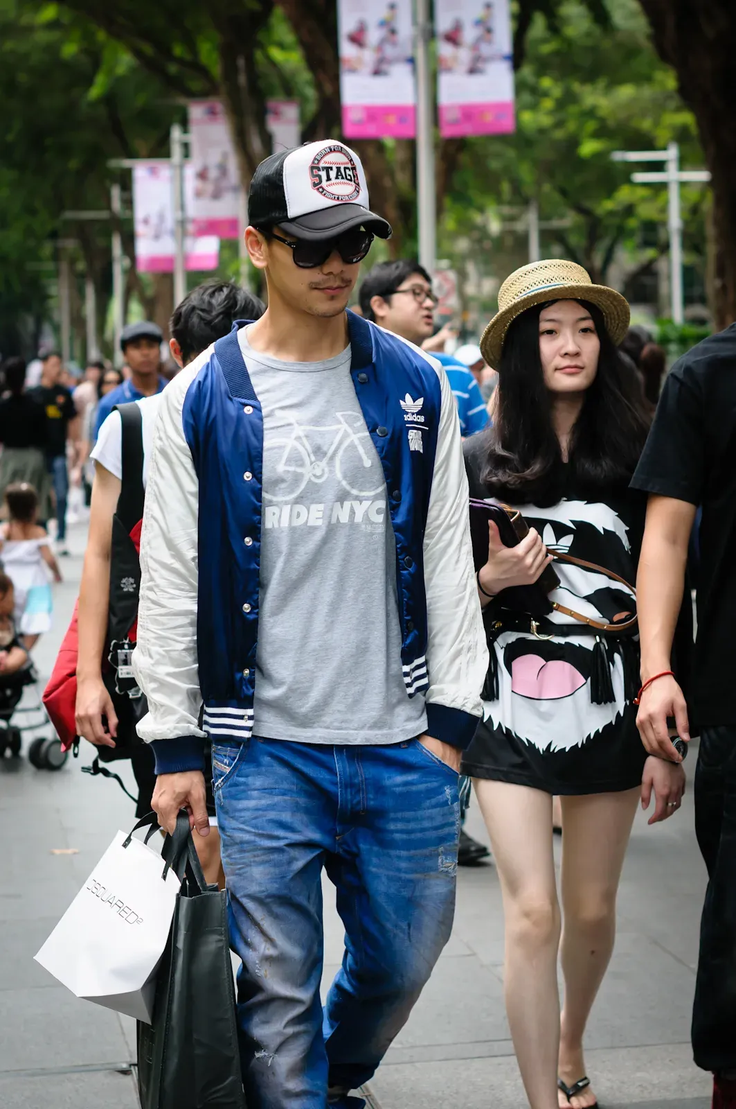 Man in cap and woman in hat