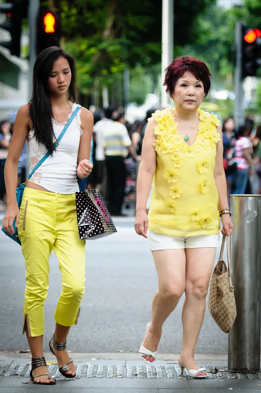 Mother and daughter wearing yellow and white