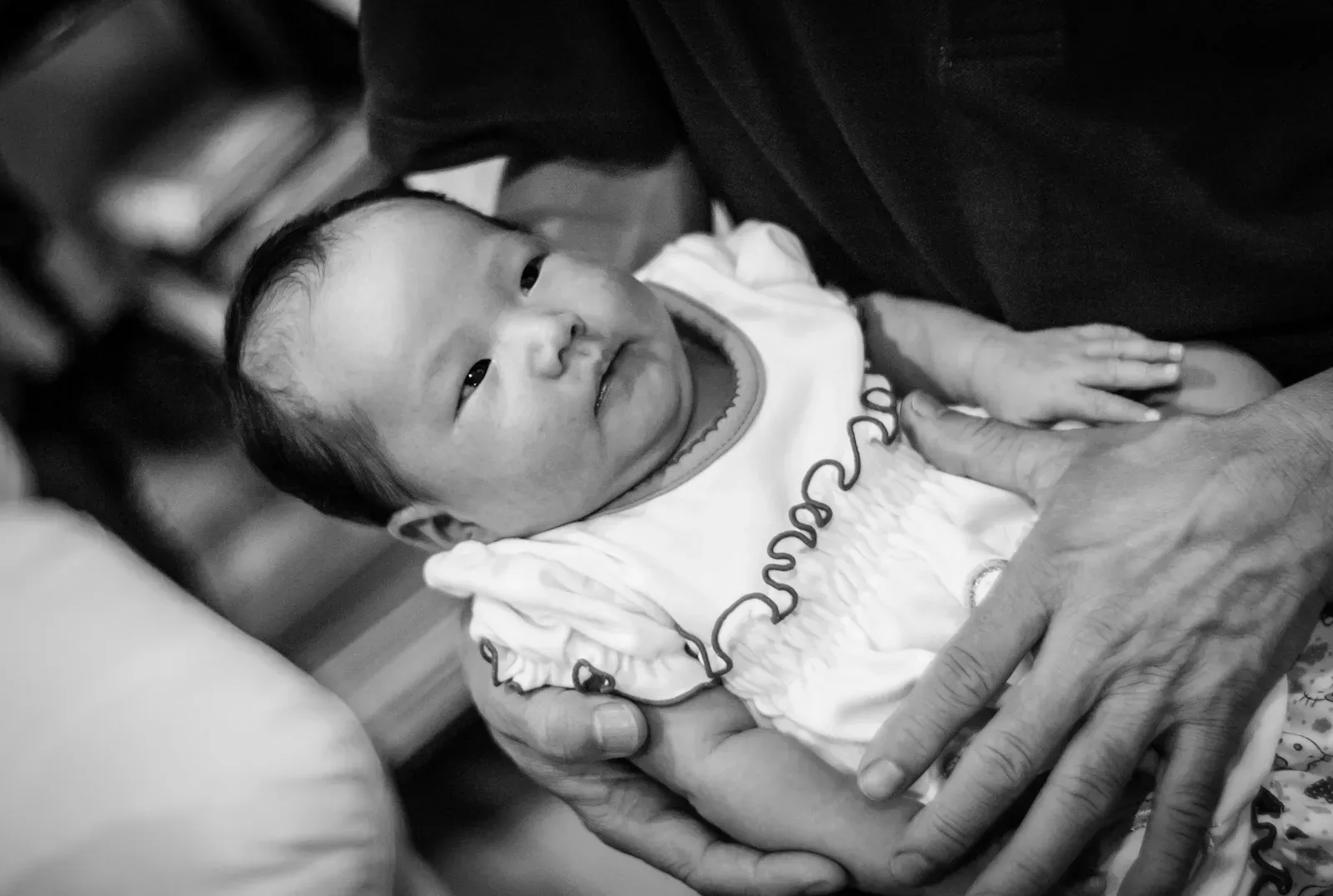 Rui Ying in grandpa's arms