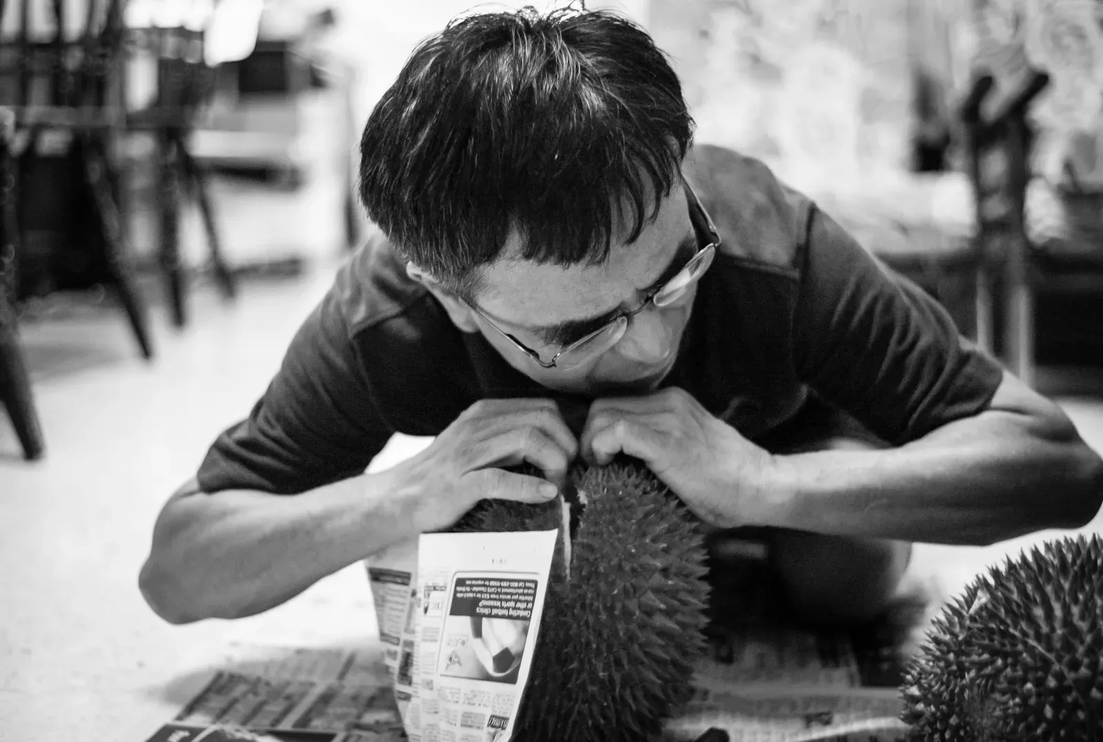 Dad opening a durian