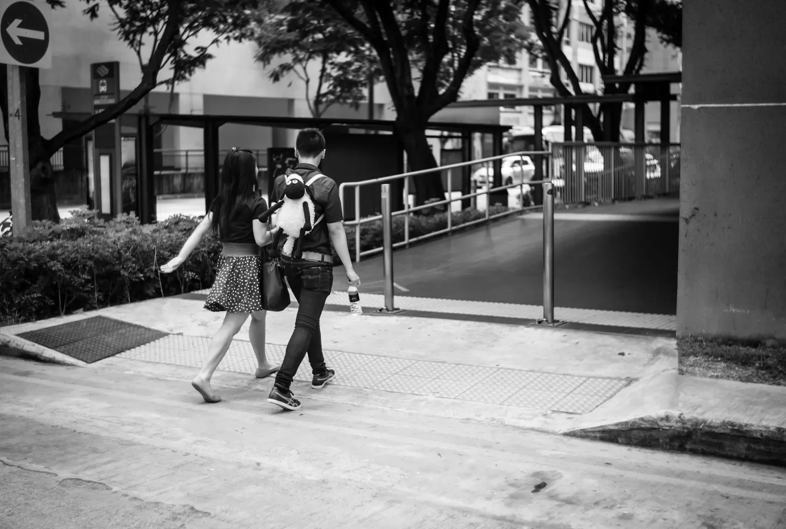 Couple with a sheep backpack