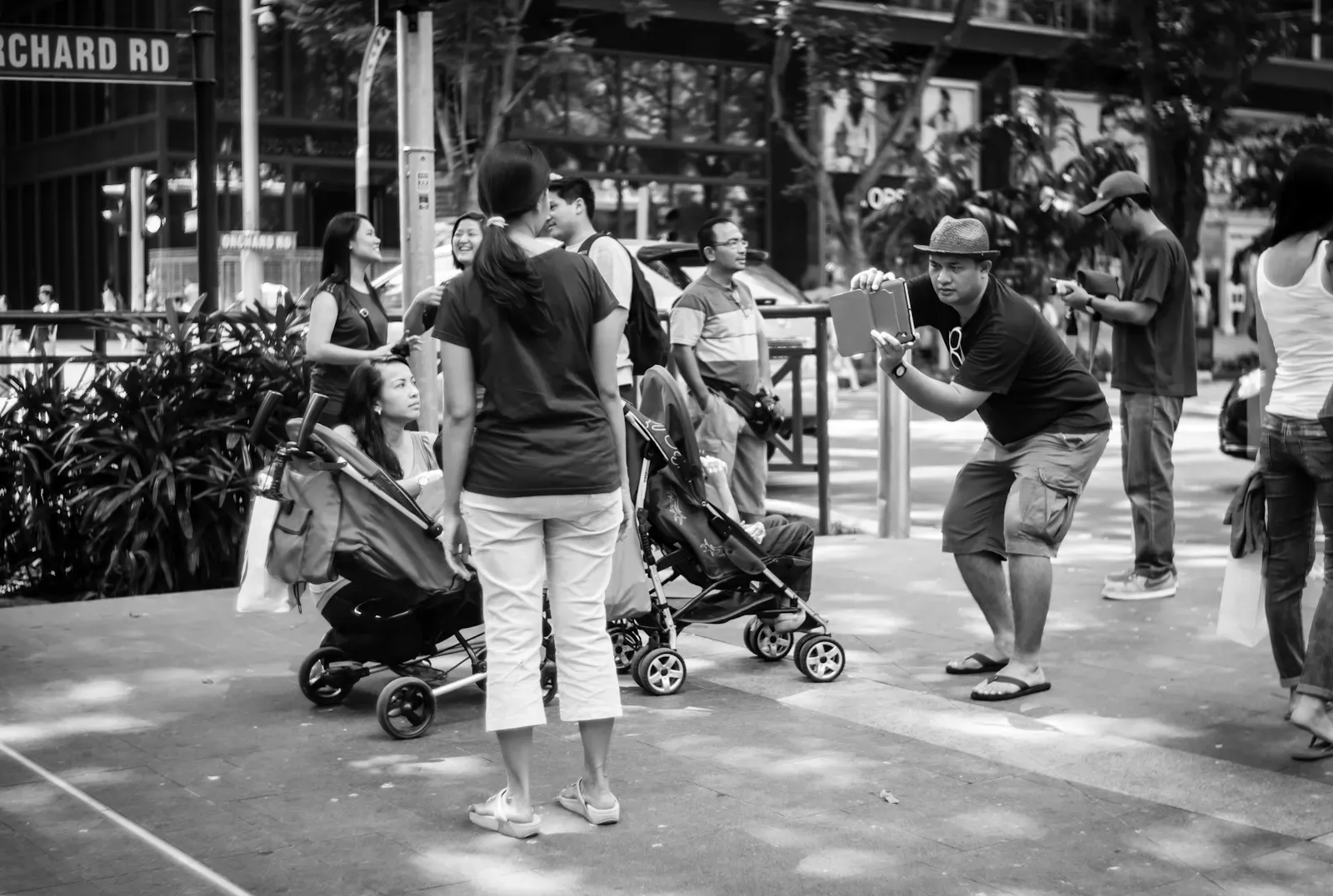 Tourist taking photos with a tablet