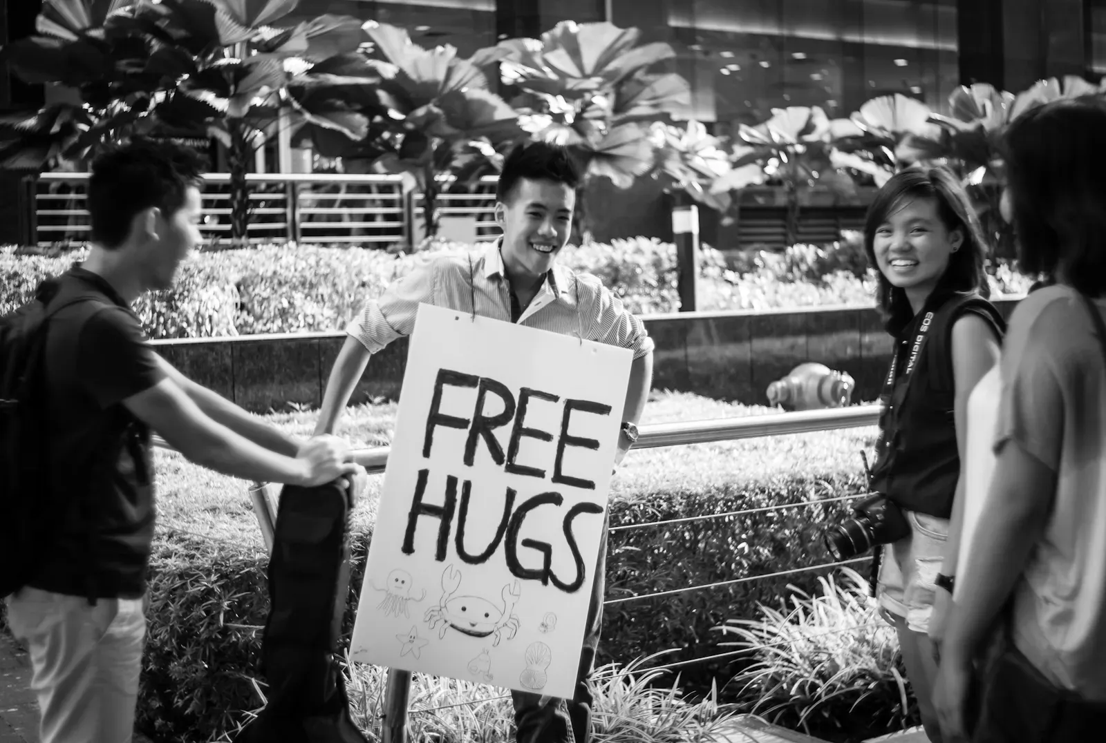 Boy with a sign saying 