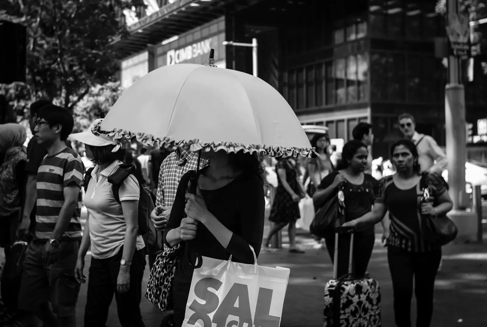 Lady with a large umbrella