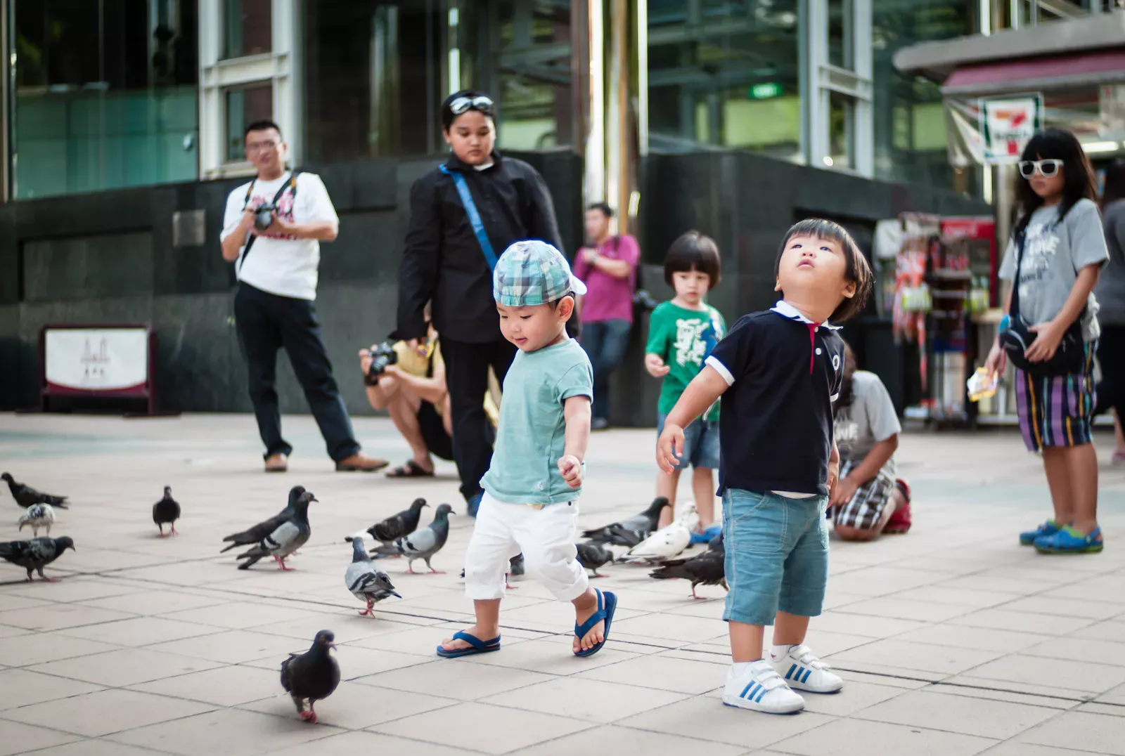 Tourists in Orchard Road looking upwards