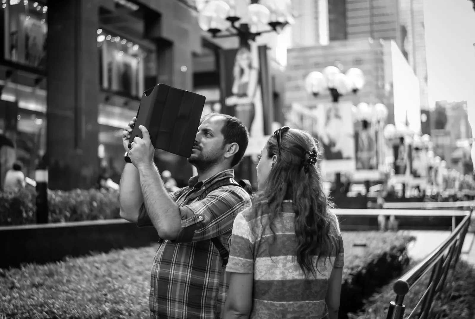 Photographer shooting along Orchard Road