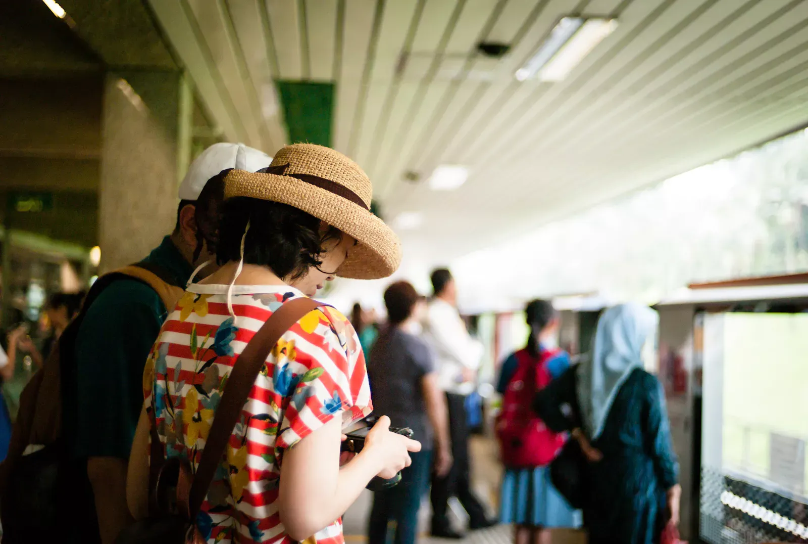 Tourists in the Ang Mo Kio MRT station in Singapore