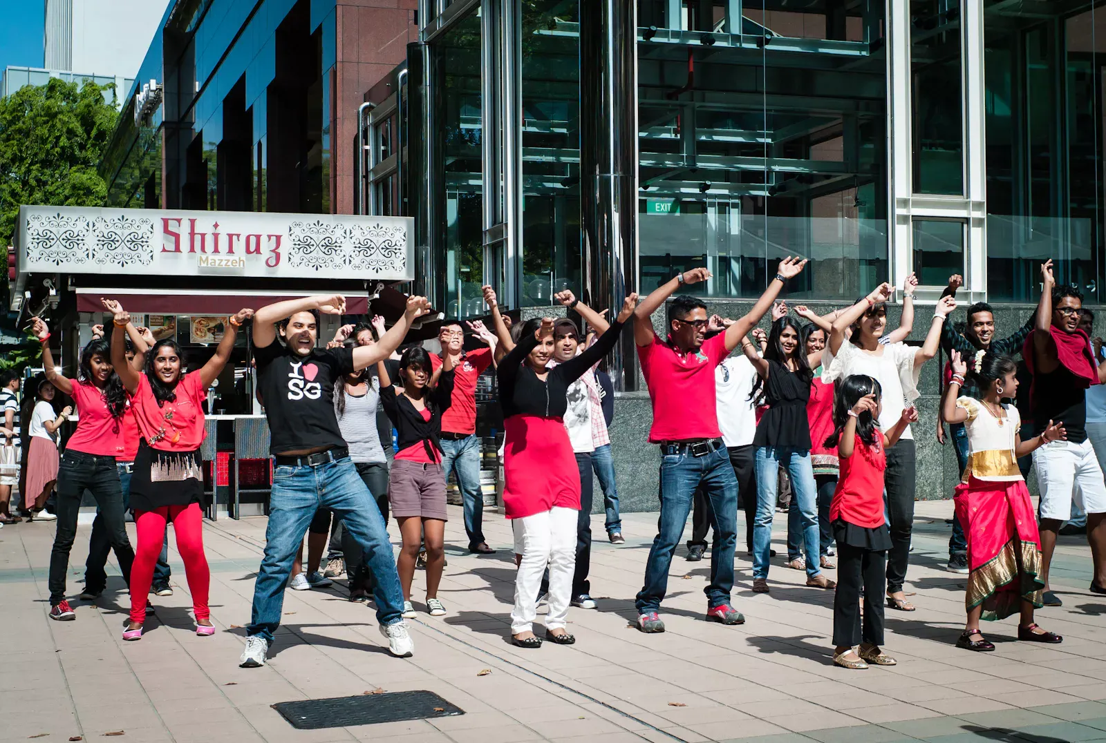 A group of Indian dancers in a flash mob along Orchard Road