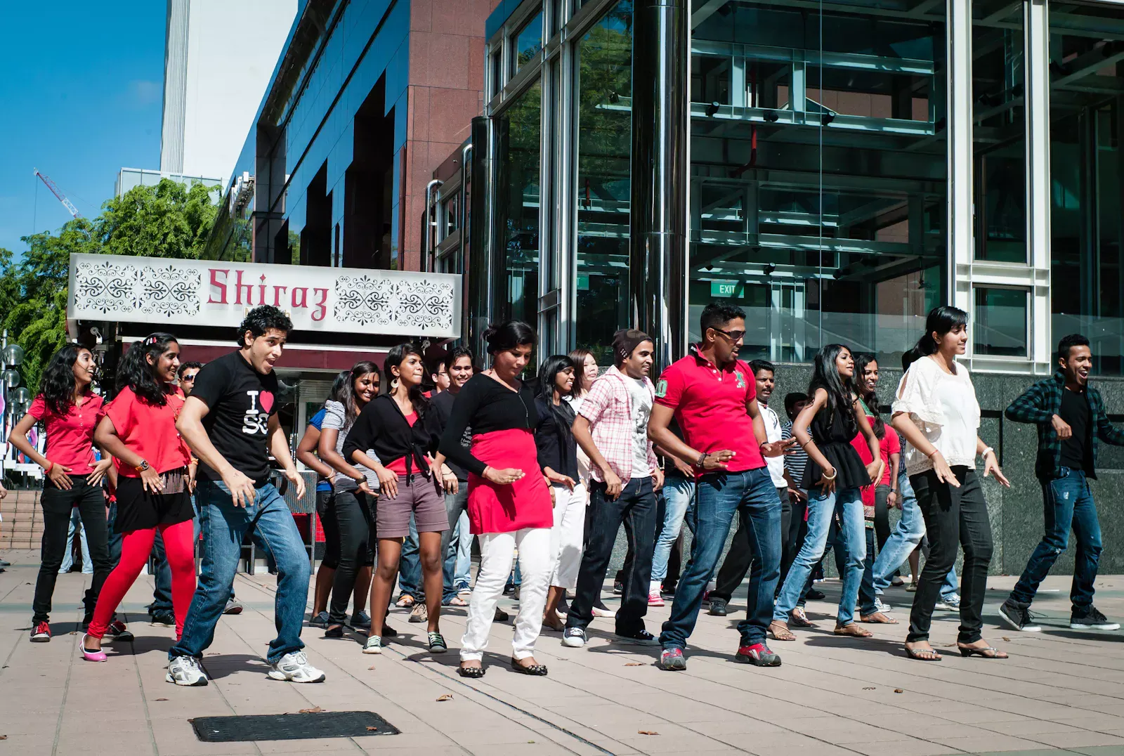 A group of Indian dancers in a flash mob along Orchard Road