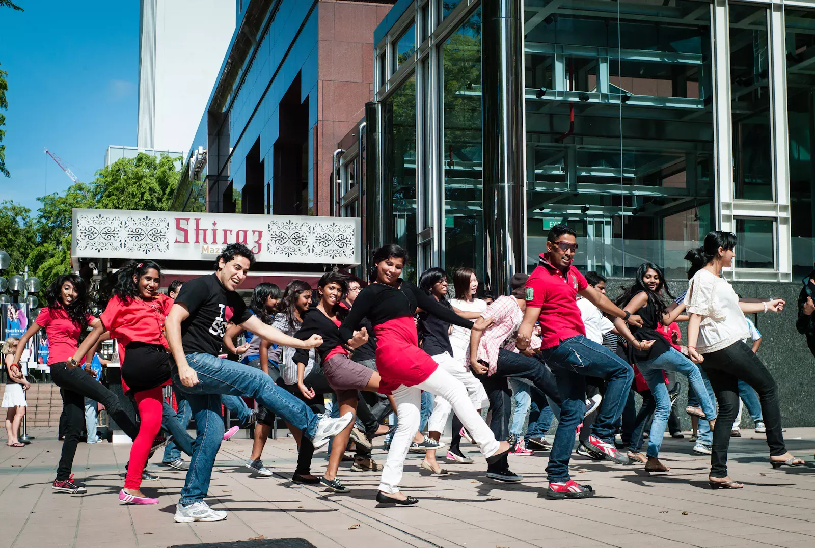 A group of Indian dancers in a flash mob along Orchard Road