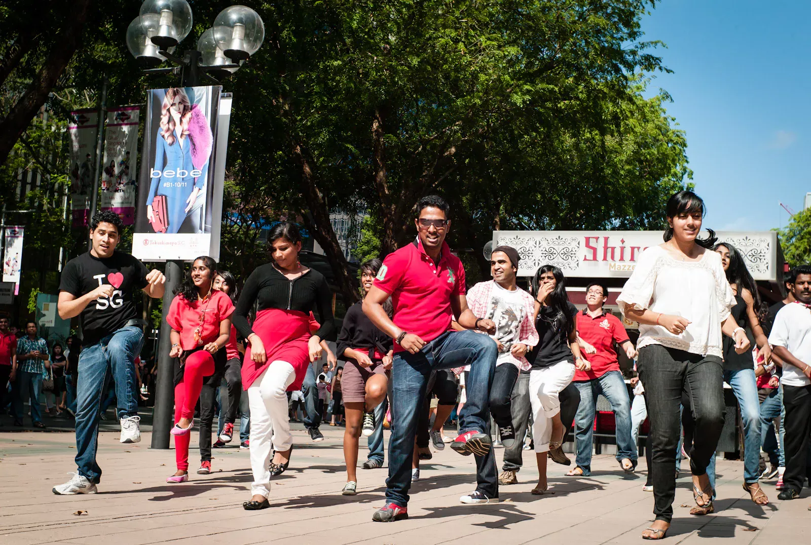 A group of Indian dancers in a flash mob along Orchard Road