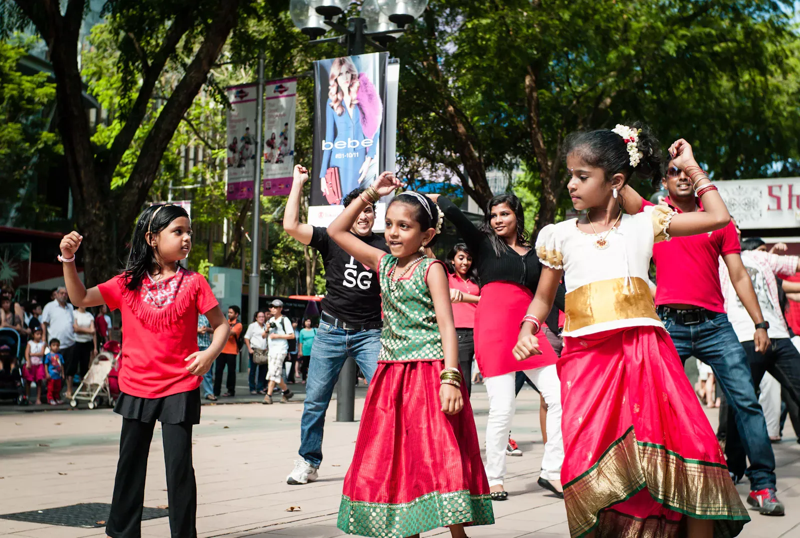 A group of Indian dancers in a flash mob along Orchard Road