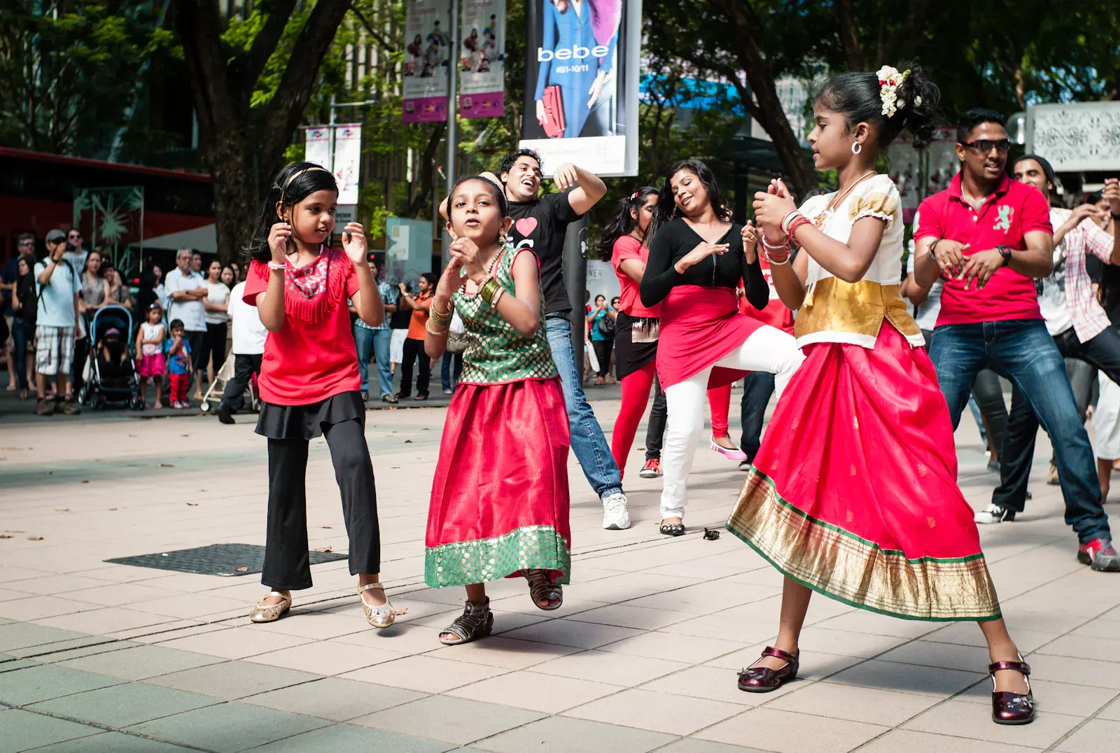 A group of Indian dancers in a flash mob along Orchard Road