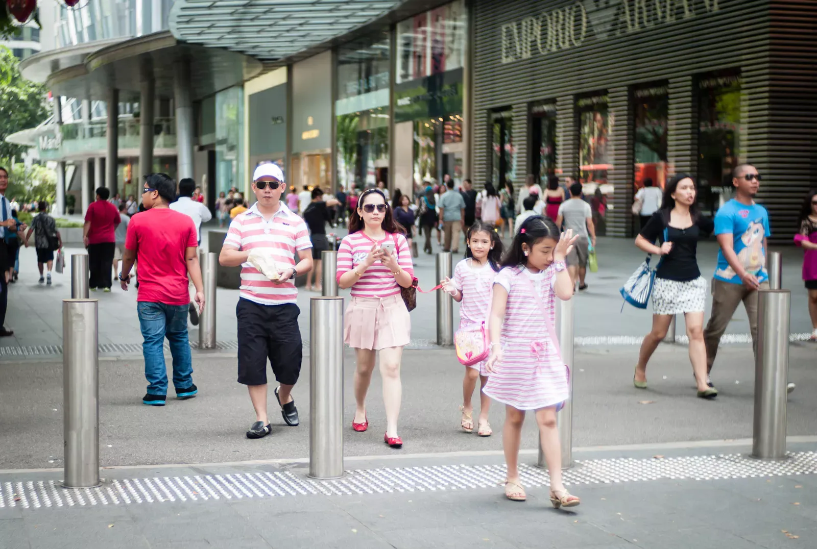 Family of four wearing stripes