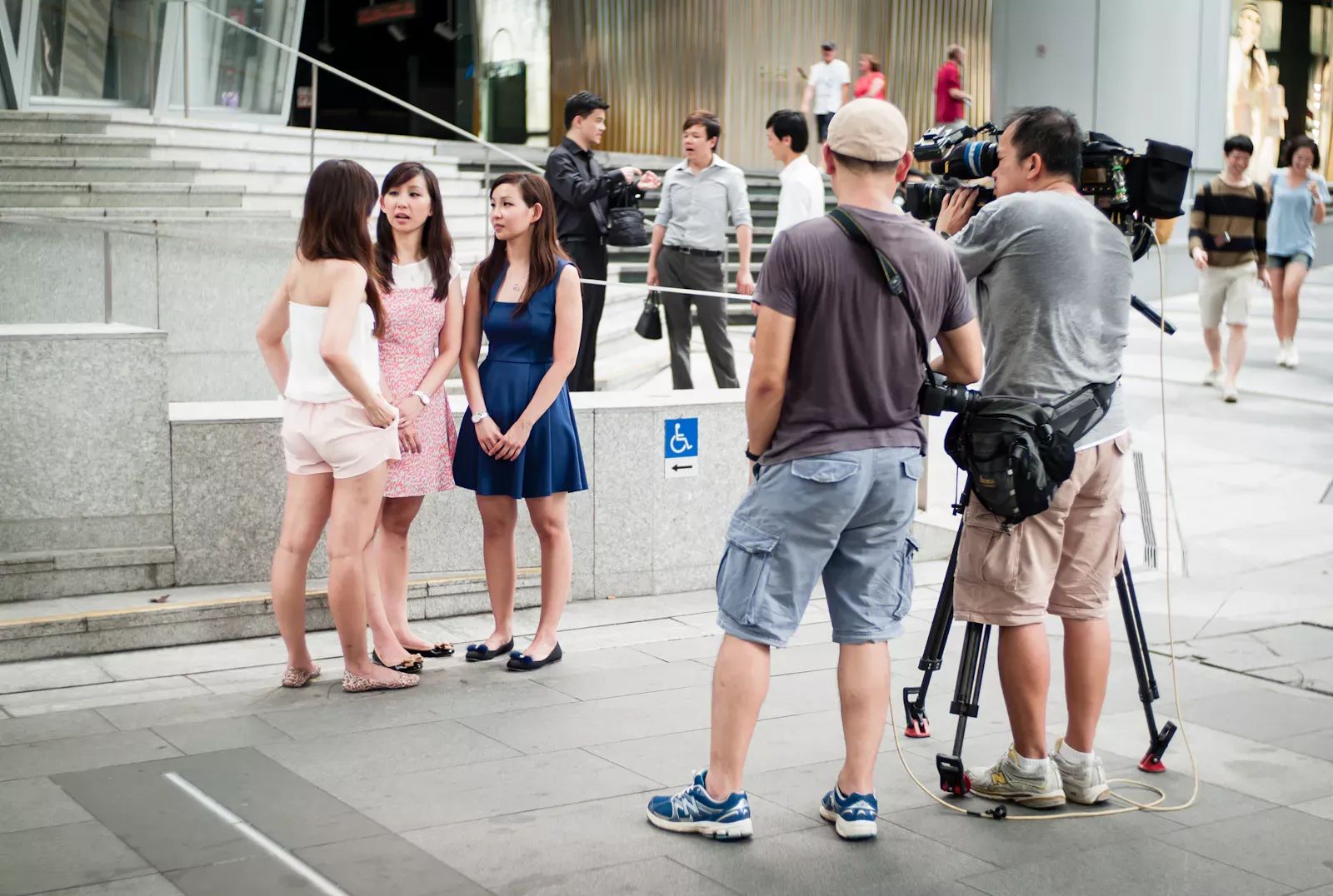 Video crew at work along Orchard Road