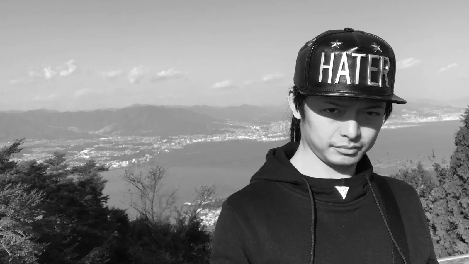 Self-portrait in Hater snapback