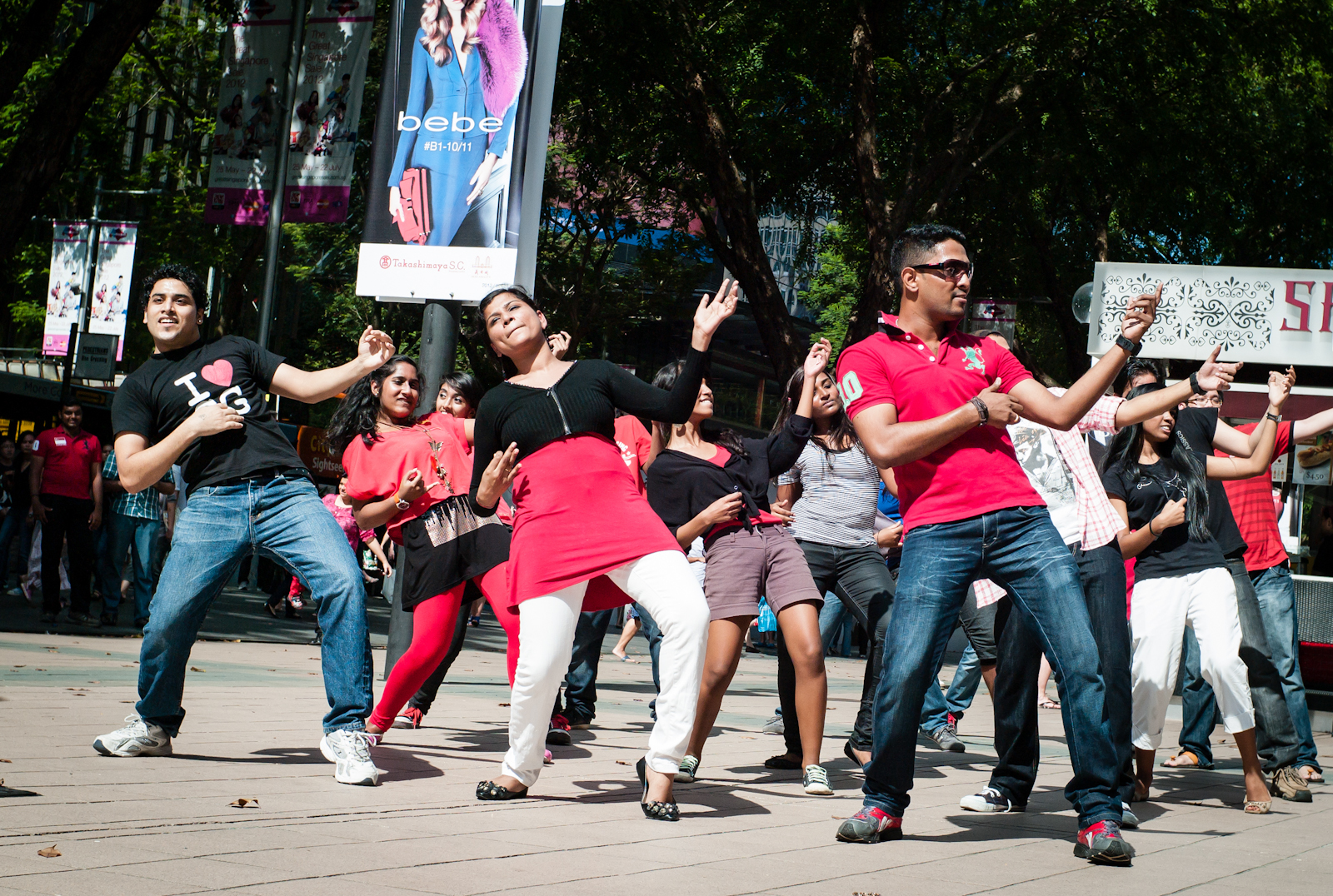 A group of Indian dancers in a flash mob along Orchard Road